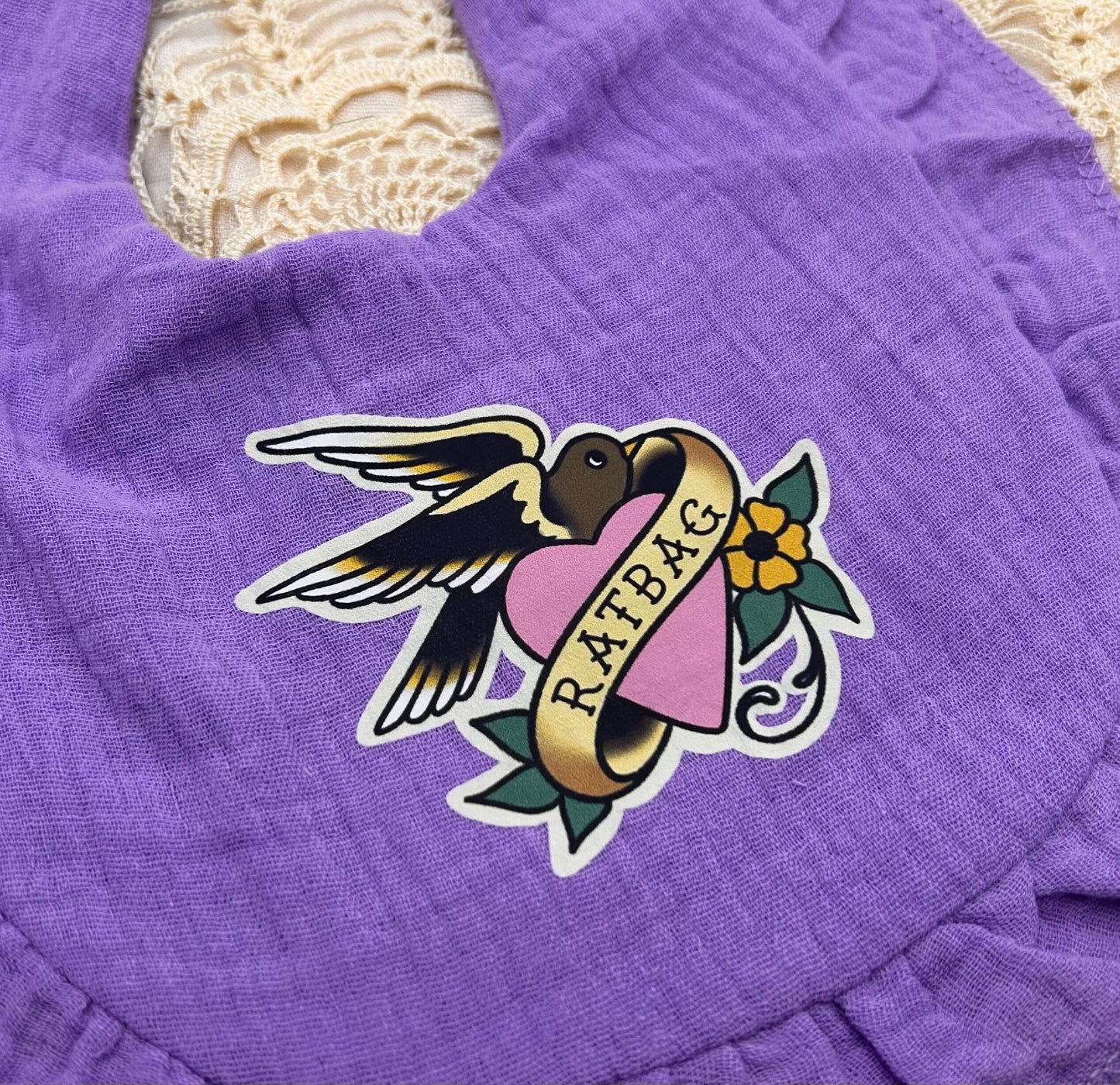 Muslin Frill Bib - Purple 'Ratbag'