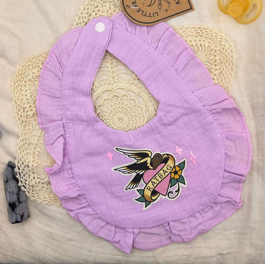 Muslin Frill Bib - Purple 'Ratbag' with Glitter Details